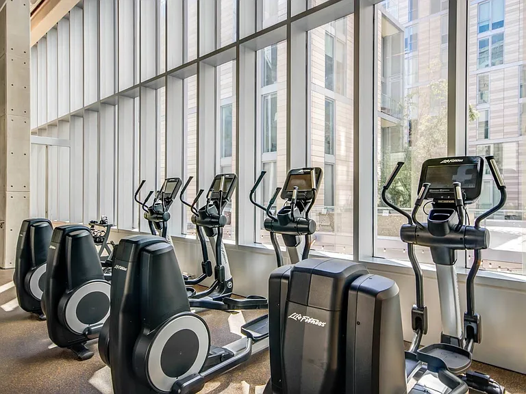 Get in the zone with sunlit cardio and city views.