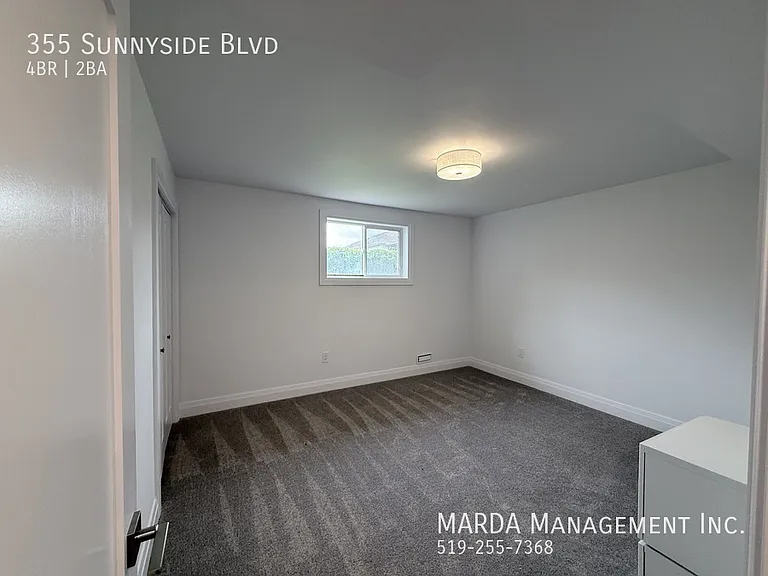 355 Sunnyside Blvd — Photo 50