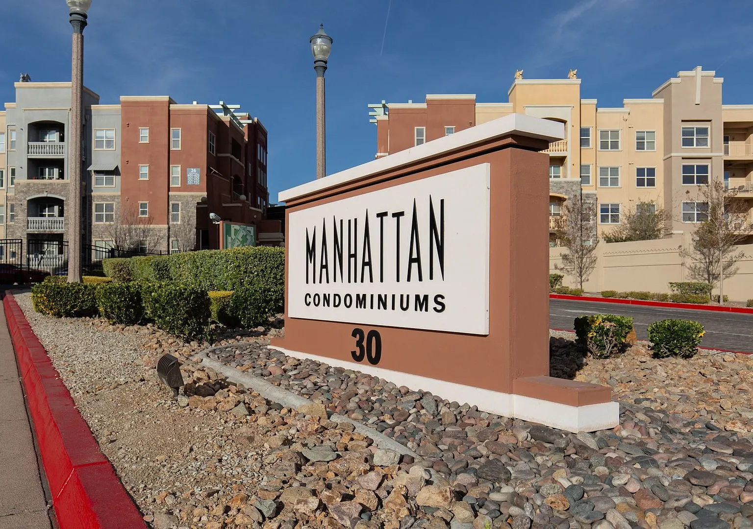 Upgraded 4th floor unit in upscale guard gated community just South of the Strip — Photo 1