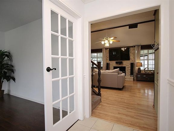View of the family room from the entry way looking out from the Study.