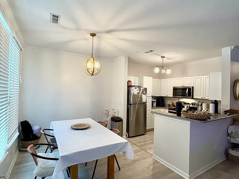 Another view of the current tenants dining and kitchen view