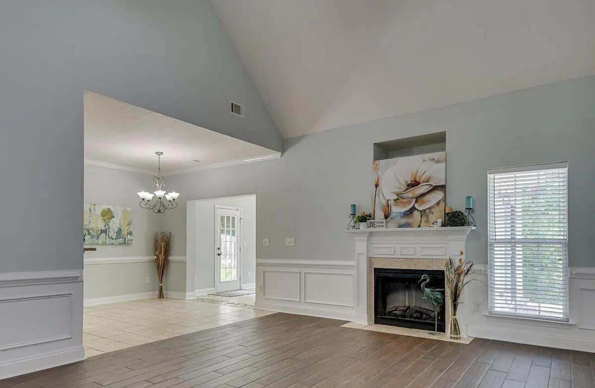 Living room, breakfast area with part of the sun room - 2441 River Birch Dr