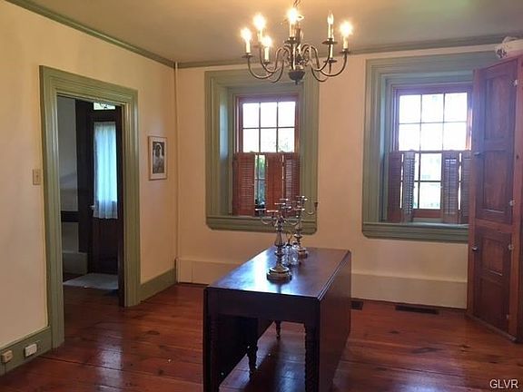 Dining room with pumpkin pine floors