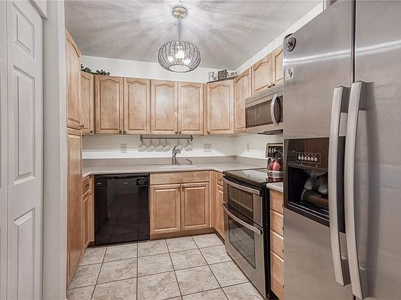 4th image of 8719 Shadow Wood Boulevard #209