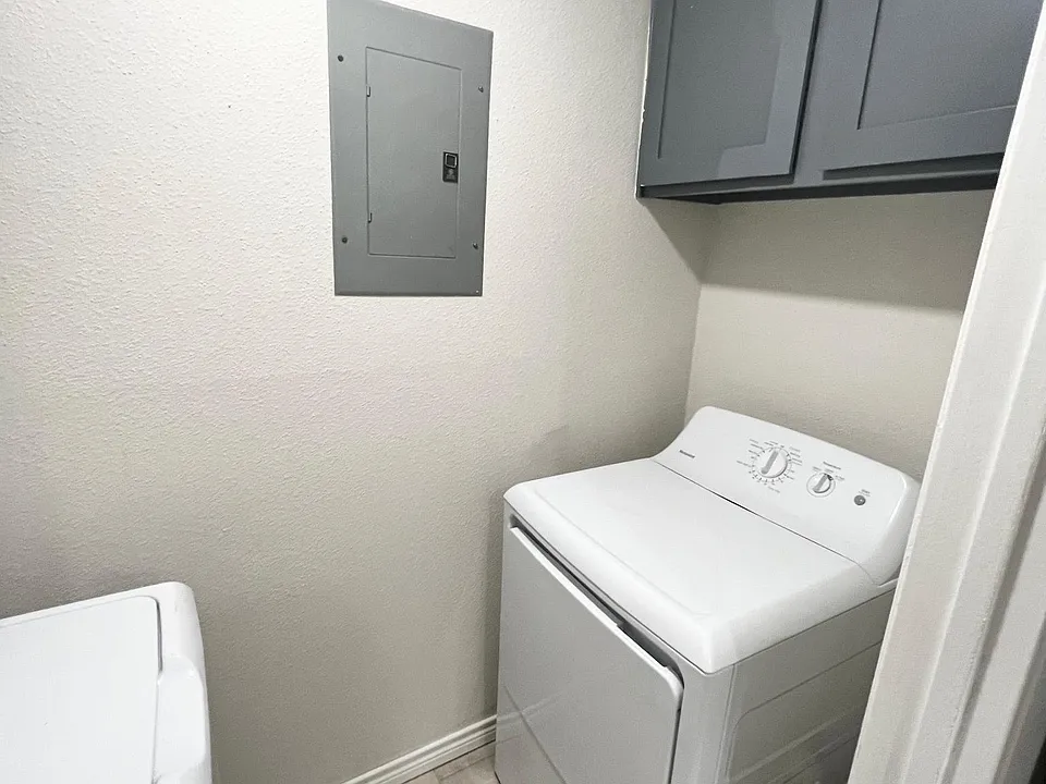 Full size washer and dryer included in the laundry room.