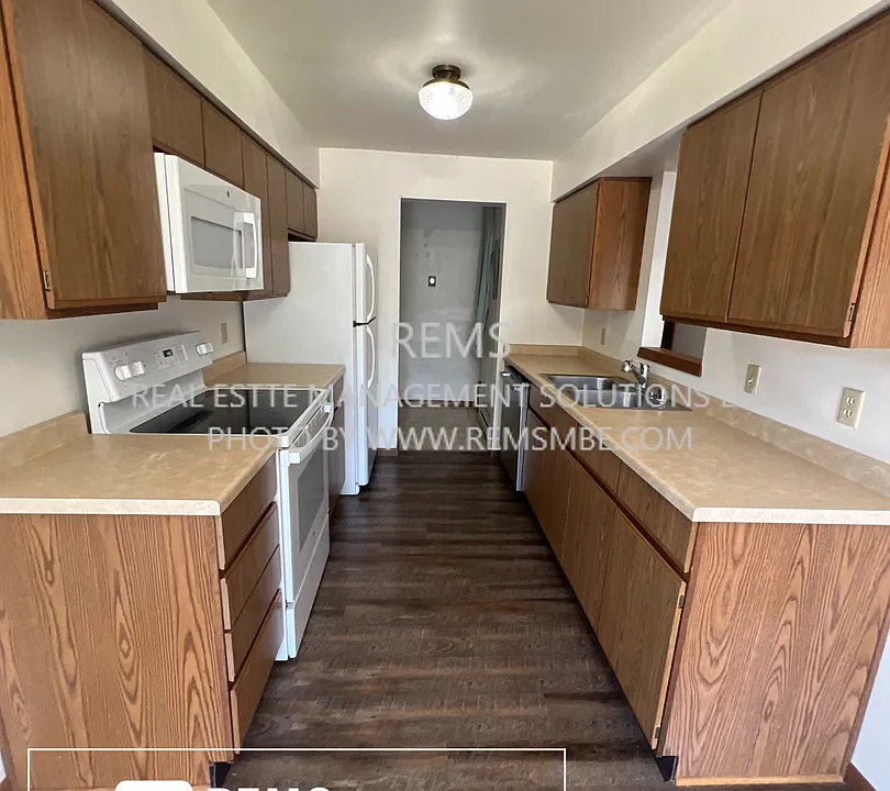 210 W John St