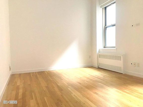 5th image of 215 W 10th St APT 3A