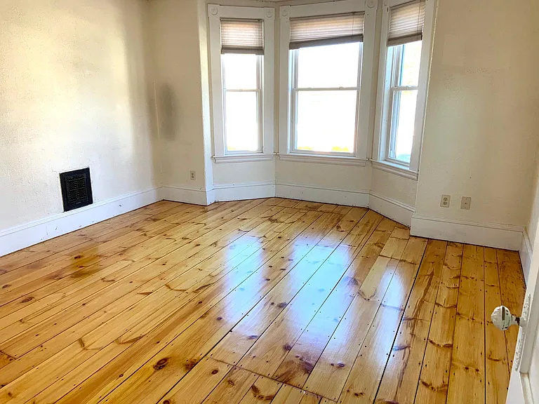 Large 1st bedroom - floors just refinished