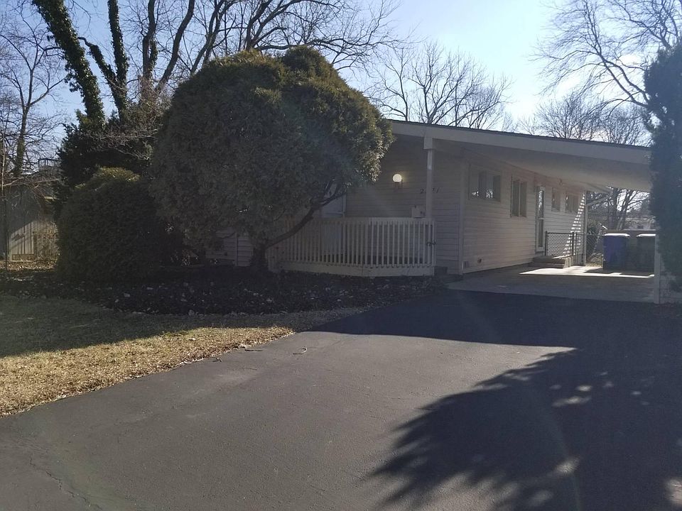 Front yard showing carport and front entrance