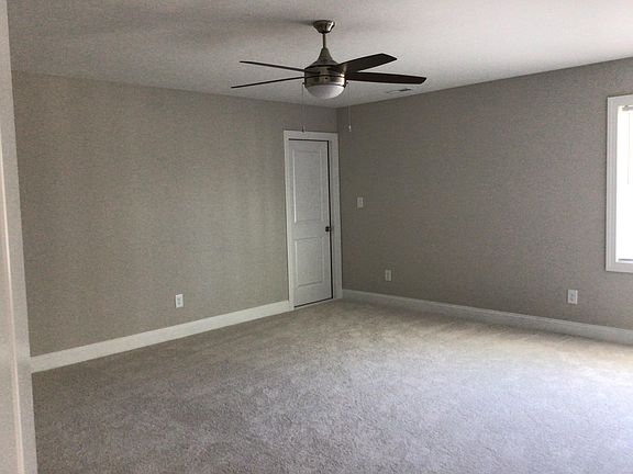 large bonus room w/ walk in storage room