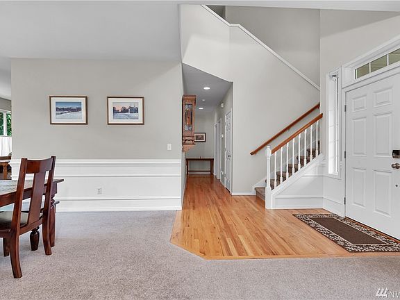 Hardwood floors in entry and hallway