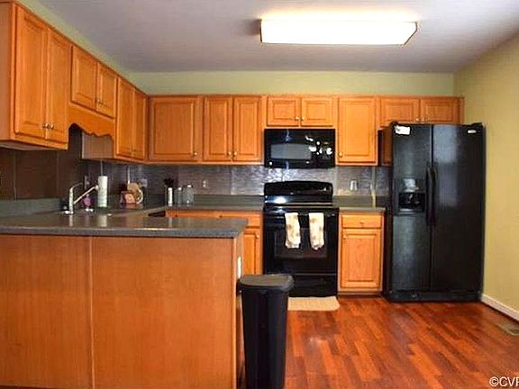 There are abundant cabinets in the kitchen. New waste despos