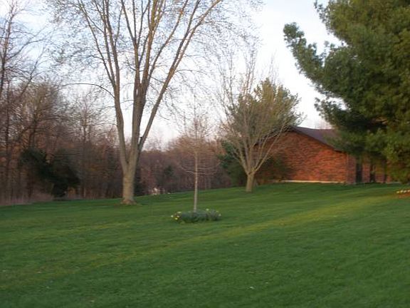 Side of home with yard.