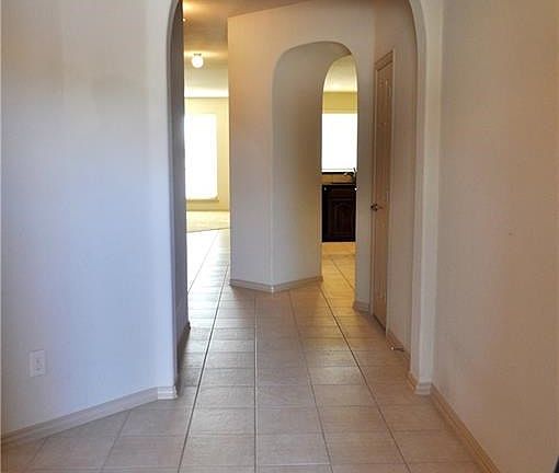 A very spacious entry hall way with a formal living-study or dining room just to the left. So nice to have options.