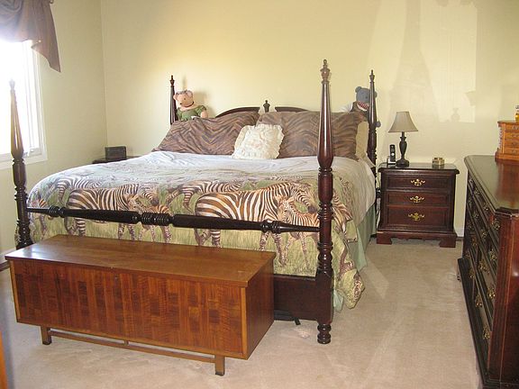 Master bedroom has walk-in closet & new mahogany floor (area rug in photo)