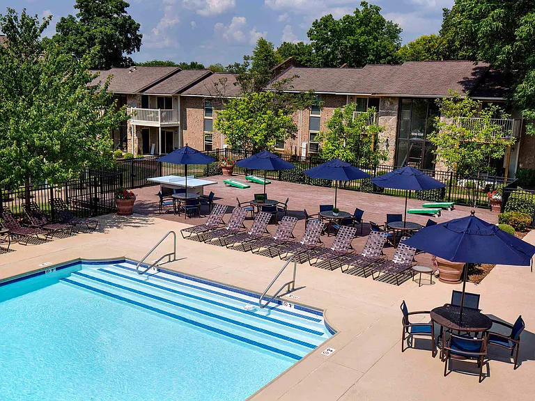 Resort-style pool and expansive sundeck with lounge seating
