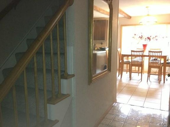 IMPRESSIVE ENTRY WITH EUROPEAN IMPORTED TILE AND GUEST POWDE