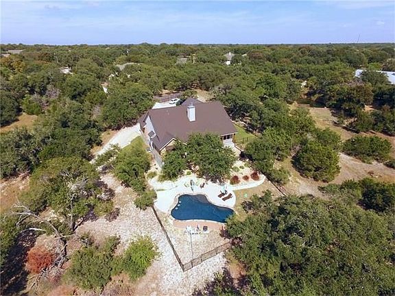 aerial view of home and pool