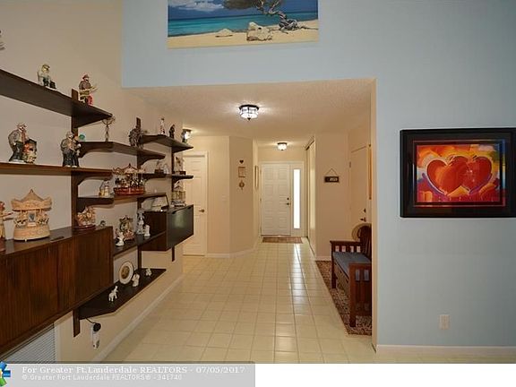 INSIDE LARGE FRONT FOYER