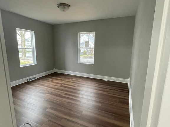 Front living room all new flooring and windows. window coverings will be included.