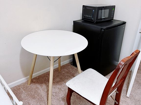 Fridge, microwave and furniture included