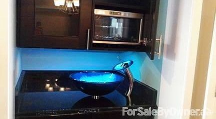 Private Bar with Wine Cooler
						:
						Bar has granite counter tops and spectacular sink bowl! Under-cabinet lighting.