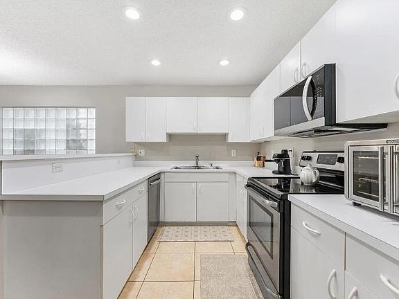 3rd image of 12230 DARTMOOR DRIVE Drive