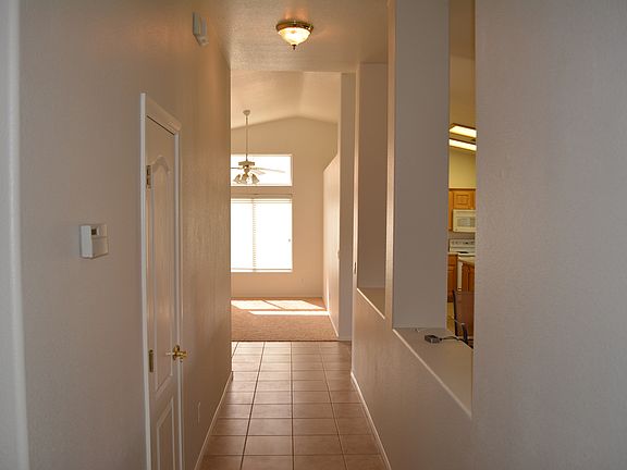 Hall to three bedrooms