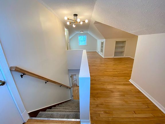 Primary Suite - Expansive upper-level suite with refinished maple floors