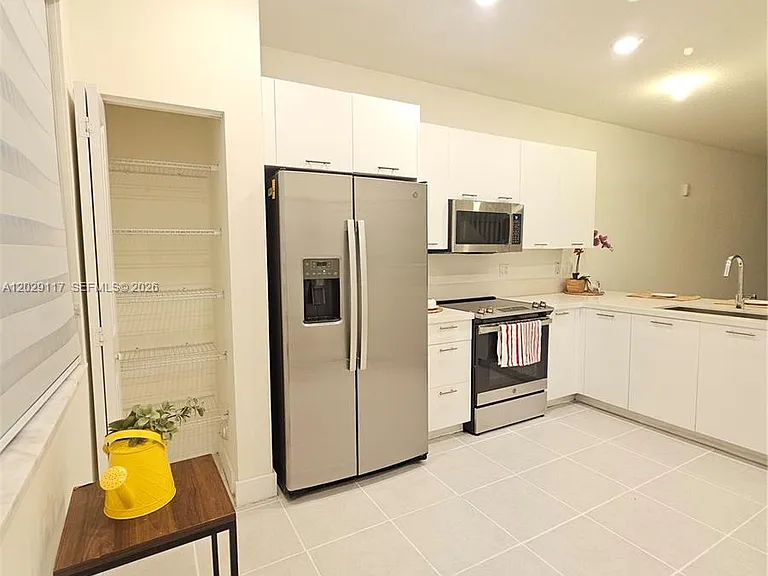6453 NW 102nd Path #103 — Photo 10