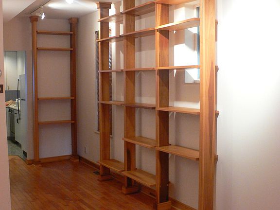 Custom built library with track lighting...great for art gallery display