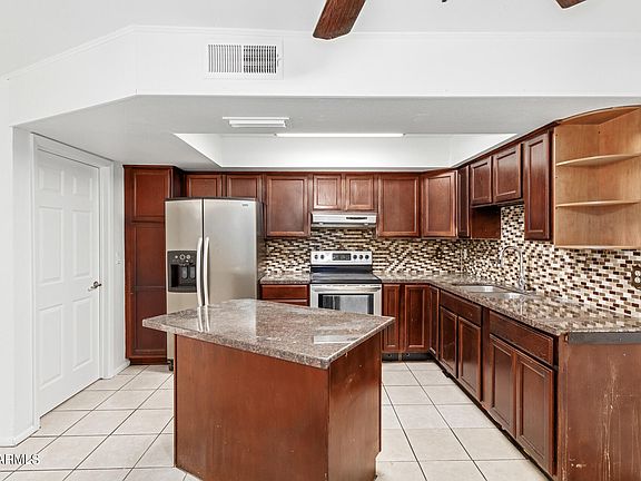 5th image of 7552 W TURNEY Avenue