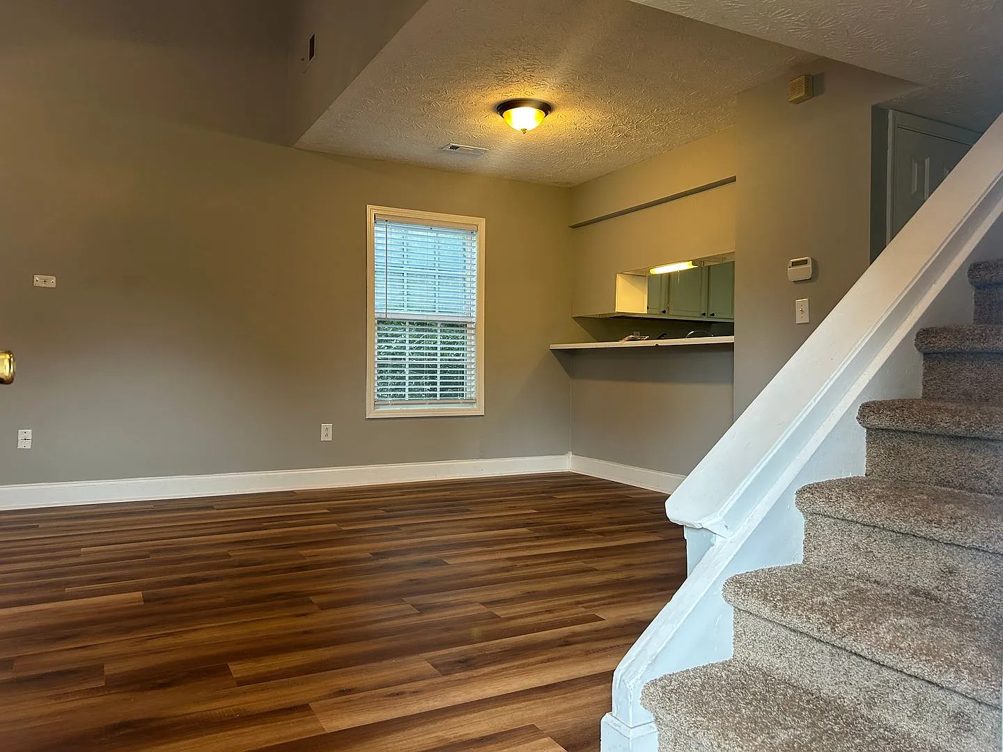 Welcome home! Great location! 2 bed, 1.5 bath, large kitchen, parking for 2, lots of privacy, W/D... — Photo 2