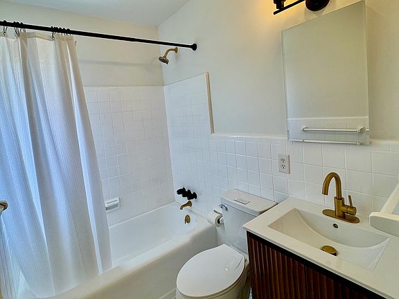 Bathroom features Tub/Shower with Opening Medicine Storage Cabinet with Linen Closet Right Outside Bathroom