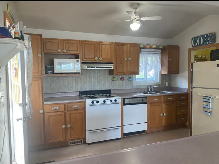 Kitchen, then far right is bathroom