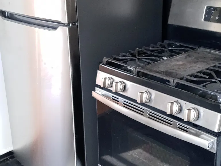 New frig and 2 year old stove.