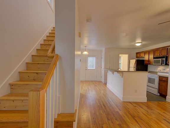 As you enter, the stairway going up is on the left.