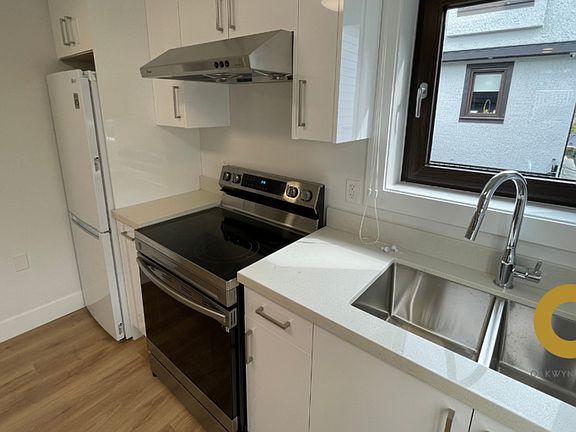 3rd image of 321 E 64th Ave