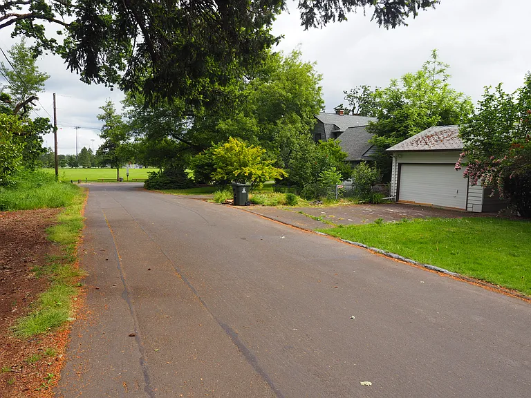 View looking north; garage on right side, park at the end of the road.