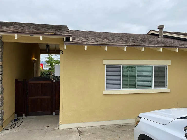 front: driveway and breezeway entrance to studio