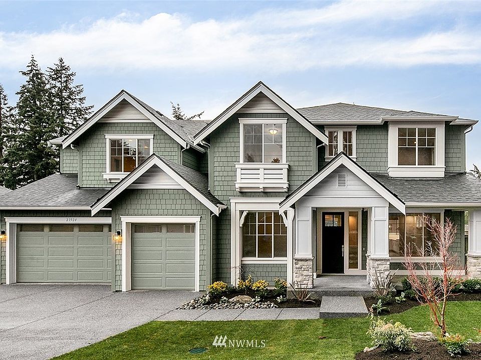 The Stipek plan on Lot 9 is UNDER CONSTRUCTION! This photo is taken of a sold home of the same floorplan in a different community.  Home has not yet been painted.  Colors, Design, Features are subject to change.