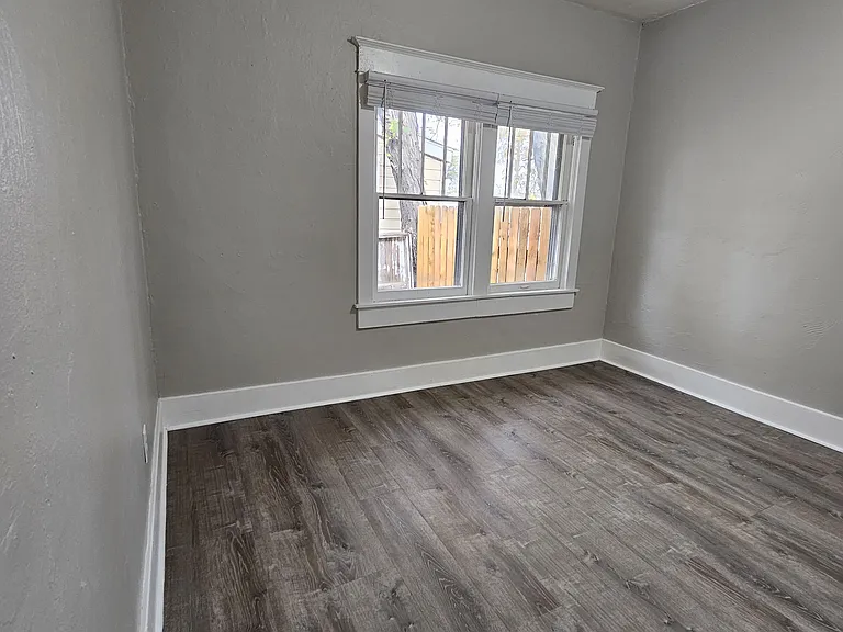 Rear Bedroom 11' x 11' with ceiling fan