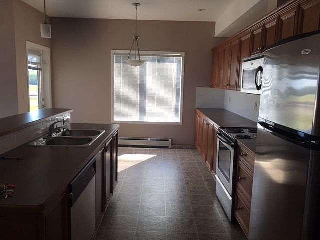 2nd image of 44403 67a Ave #411