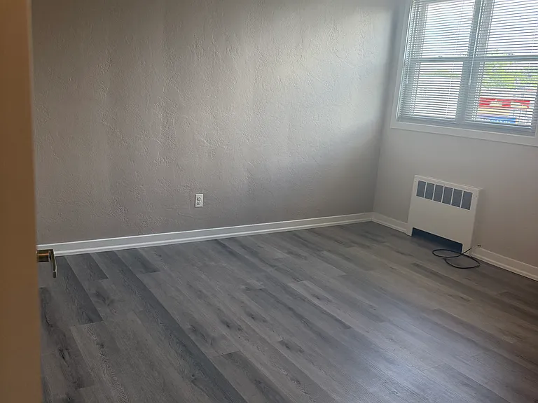 Bedroom 170 sq feet, natural light and ceiling fan with closet.