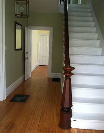 Beautiful staircase with gleaming mahogany banister