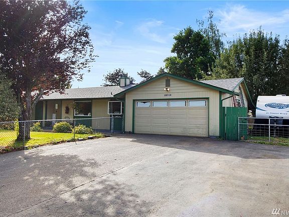 Two car garage, extra wide driveway & RV Parking!