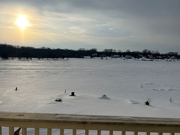 view of lake from master bedroom private balcony