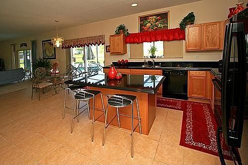 Extremely Spacious Kitchen w/ an Island and Soft Cinnamon Cabinetry!