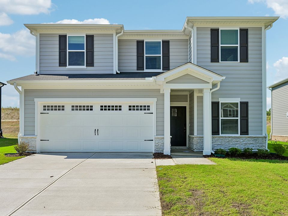 Quinton front exterior at a Meritage Homes community in Zebulon, NC.