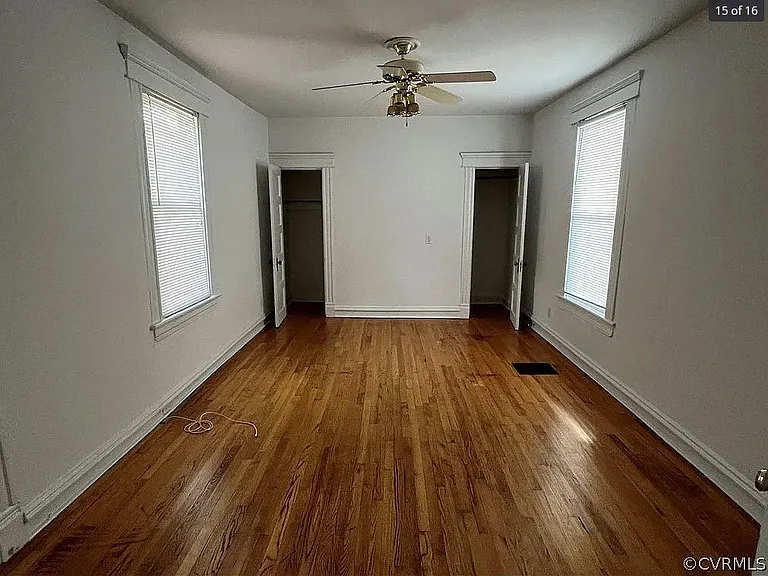 Master bedroom with full bath and walk in closet hardwood floors